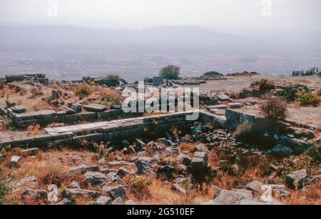 Pergamon/Pergamos - ruins of ancient city in Izmir province (a rich and powerful city in Mysia in Hellenistic era), Turkey. View from Pergamon site on Bergama town. Archival scan from a slide. October 1985. Stock Photo