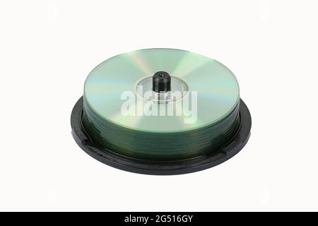 Cd stack isolated on white. Spindle of CD and DVD.  Stock Photo