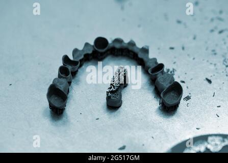 Tooth dental crowns created on 3d printer for metal Stock Photo