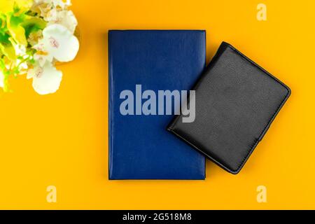 Freelancer workspace composition, flat lay background with leather notebooks on the table, mockup concept Stock Photo