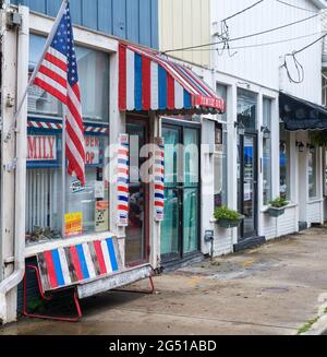 NEW ORLEANS, LA, USA  - JUNE 23, 2021: Red, White and Blue themed Family Barber Shop in Uptown neighborhood Stock Photo
