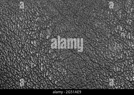Black leather texture closeup background, deatiled surface Stock Photo