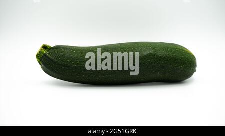 green zuccini on white background Stock Photo