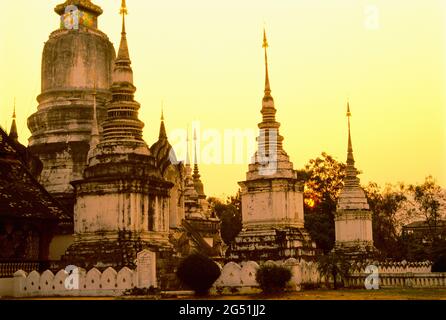 Exterior of Wat Suan Dok Temple at sunset, Chiang Mai Province, Thailand Stock Photo