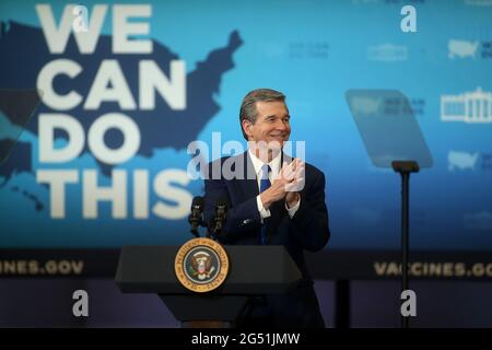 Raleigh, North Carolina, USA. 24th June, 2021. North Carolina Governor ROY COOPER speaks before President JOE BIDEN took the stage during his visit to the Green Road Community Center in Raleigh, N.C. as part of his continued efforts to encourage people across the country to get the COVID-19 vaccine. The visit to the state capital comes as part of Biden's ''˜National Month of Action, ' a nationwide effort to get 70% of adults at least partially vaccinated by July 4. The N.C. Department of Health and Human Services reported that just 55% of adults in the state have received a dose of the vaccin Stock Photo