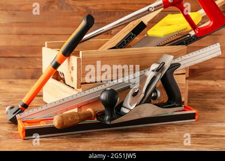 Set of carpenter's tools on wooden background Stock Photo
