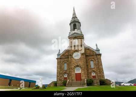 Église catholique Saint-Pierre Roman Catholic Church, Roman 120 year old roman catholic church located in Cheticamp, Cape Breton, Nova Scotia, Canada Stock Photo