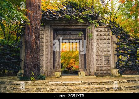 November 10, 2018: Main entrance gate of Kubota Itchiku art museum, devoted to a Japanese textile artist, Kubota Itchiku, stands in the wooded hills a Stock Photo