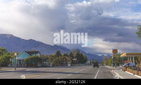 Historic Small mountain town in California with smoke from wild fire in sky Stock Photo