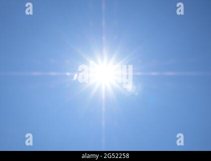Sun and blue sky background Stock Photo