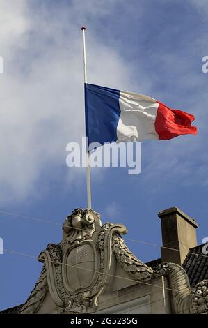 Copenhagen Denmark   17 July 2016-European union and French flags at half mast at french embassy and people are puring with flowers to pay tribute and Stock Photo