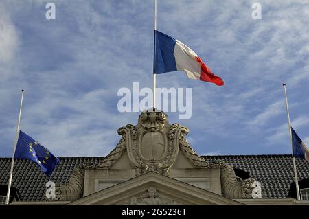 Copenhagen Denmark   17 July 2016-European union and French flags at half mast at french embassy and people are puring with flowers to pay tribute and Stock Photo