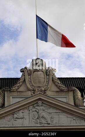 Copenhagen Denmark   17 July 2016-European union and French flags at half mast at french embassy and people are puring with flowers to pay tribute and Stock Photo