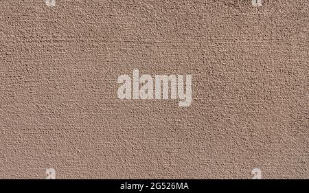 Close-up of new brown granular plaster Stock Photo