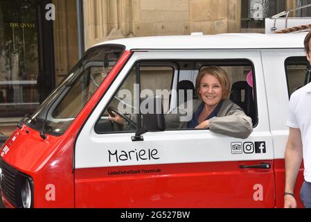 Cologne, Germany. 24th June, 2021. Actress Mariele Millowitsch christens VW oldtimer Billis T3 with the names 'Pitter' and 'Mariele'. With this buses love your city - tours through Cologne can be booked. Credit: Horst Galuschka/dpa/Alamy Live News Stock Photo