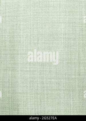 light green fabric texture. natural linen background. Stock Photo