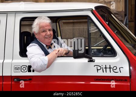 Cologne, Germany. 24th June, 2021. Actor Peter Millowitsch christens VW oldtimer Billis T3 with the names 'Pitter' and 'Mariele'. With this buses love your city - tours through Cologne can be booked. Credit: Horst Galuschka/dpa/Alamy Live News Stock Photo