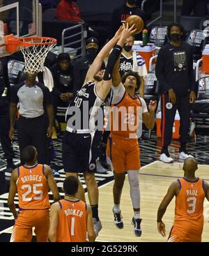 Los Angeles, USA, June 24, 2021: Los Angeles, United States. 25th June, 2021. Phoenix Suns forward Cameron Johnson (23) blocks the shot of Los Angeles Clippers center Ivica Zubac during the fourth quarter in Game 3 of their best-of-seven Western Conference finals matchup at Staples Center in Los Angeles on Thursday, June 24, 2021. After dropping the opening two games in Phoenix, the Clippers took Game 3, 106-92 by staying in control throughout. Photo by Jim Ruymen/UPI Credit: UPI/Alamy Live News Stock Photo