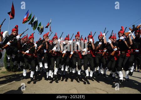 Srinagar. 25th June 2021. The Jammu and Kashmir Light Infantry Regimental Centre, showcased its latest batch of passing out young soldiers from the UT of J&K. A total of 514 young soldiers were attested today after completing one year of strenuous training, at a glittering parade at the Bana Singh Parade Ground of JAK LI Regimental centre. Credit: Majority World CIC/Alamy Live News Stock Photo