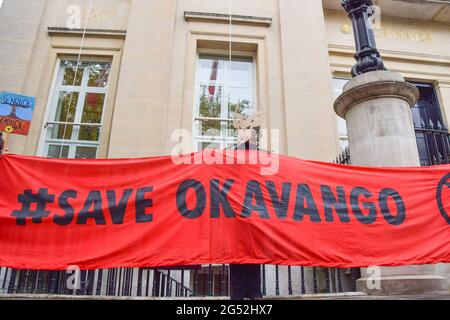 London, UK. 4th June 2021. Extinction Rebellion activists outside the Canadian High Commission on Trafalgar Square. The activists gathered to protest against oil exploration in Africa's Okavango region by Canadian oil and gas company ReconAfrica. Stock Photo