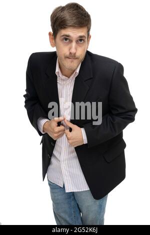Young handsome tall slim white man with brown hair in black blazer isolated on white background Stock Photo