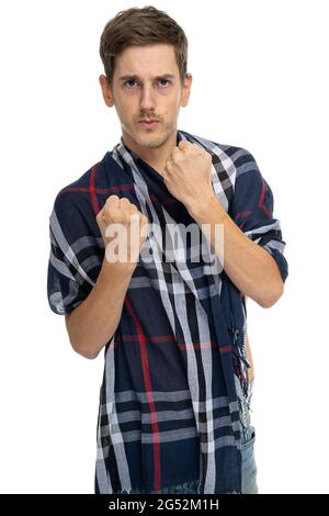 Young handsome tall slim white man with brown hair is ready to fight with scarf over his body isolated on white background Stock Photo