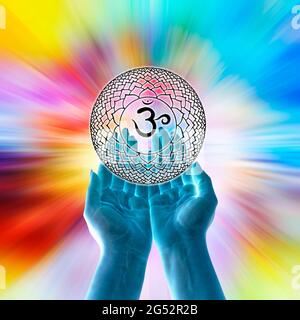 open hands and chakra symbol of Sahasrara Stock Photo