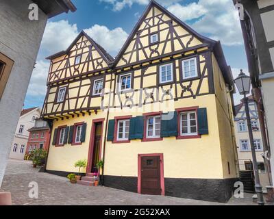 Traditional yellow half-timbered house in Neckargemund, a small town in Baden-Wurttemberg in the south of Germany