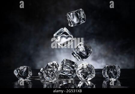 Ice cubes on black background Stock Photo