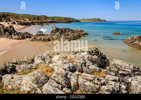 Rocks on scenic beach of golden sands and turquoise sea on Scottish north coast 500. Sango Bay, Durness, Sutherland, Highland, Scotland, UK, Britain Stock Photo