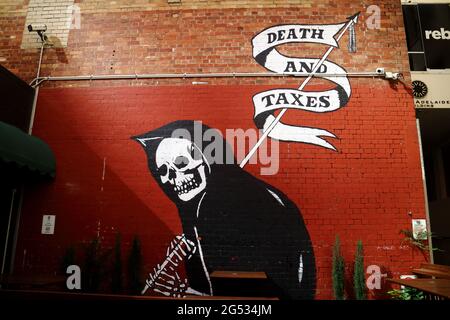 Death and Taxes Grim Reaper Mural. Artist Xato Stencil. Stock Photo