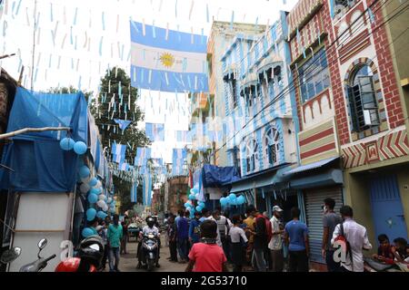 Kolkata, India. 24th June, 2021. Indian fans of Argentina and Lionel Messi, celebrate his 34th birthday at a three-story apartment painted in blue-and-white by Indian tea seller Shib Shankar Patra in Kolkata, India on June 24, 2021. (Photo by Dipa Chakraborty/Pacific Press/Sipa USA) Credit: Sipa USA/Alamy Live News Stock Photo