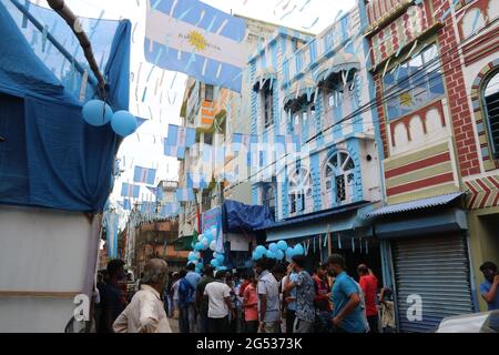 Kolkata, India. 24th June, 2021. Indian fans of Argentina and Lionel Messi, celebrate his 34th birthday at a three-story apartment painted in blue-and-white by Indian tea seller Shib Shankar Patra in Kolkata, India on June 24, 2021. (Photo by Dipa Chakraborty/Pacific Press/Sipa USA) Credit: Sipa USA/Alamy Live News Stock Photo