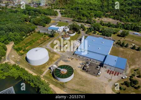 Aerial top down view on sewage treatment facilities aeration water purification tanks for modern wastewater plant Stock Photo
