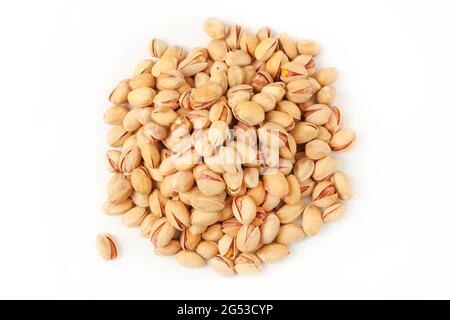Heap of salted pistachios isolated on white. View from above Stock Photo