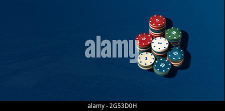 the simple abstract stack of casino chips on the color surface table ...