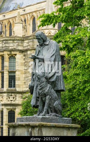 Statue of Alfred Lord Tennyson and his dog Karenina in the cathedral precinct Lincoln. Stock Photo