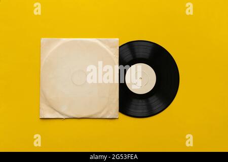 the mockup template with the new vinyl disc on color surface, music album cover design Stock Photo