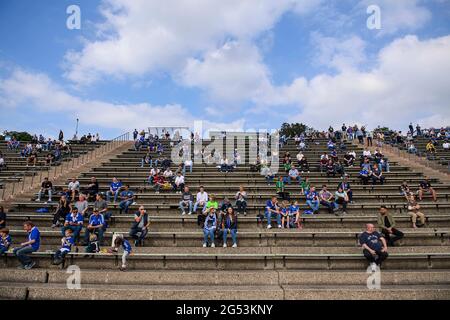 Feature, fans sit at a distance on the tribune in the new Parkstadion soccer test match, FC Schalke 04 (GE) - PSV Wesel-Lackhausen, 8: 0 on June 23, 2021 in Gelsenkirchen / Germany. Â Stock Photo