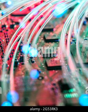 UK, Bucks, High Wycombe, Optical fibers on mother board Stock Photo