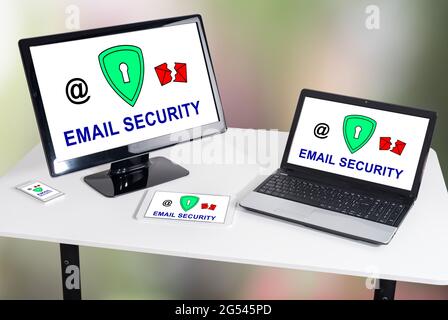 Email security concept shown on different information technology devices Stock Photo