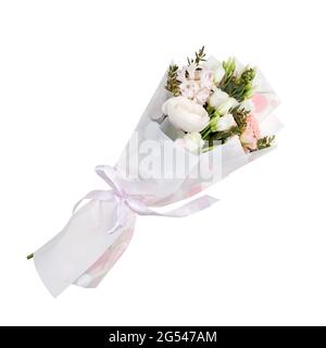 Delicate holiday bouquet wrapped in bright floral paper on a blue  background Stock Photo - Alamy