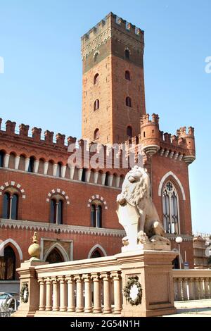 Asti, Piedmont, Italy - Piazza Roma, Palazzo Medici del Vascello and Comentina tower. Stock Photo