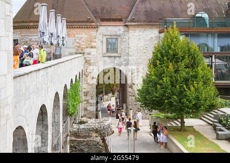 Ljubljana, Slovenia - August 15, 2018: A view of the Ljubljana Castle entrance from its inner courtyard beside an arched panoramic terrace Stock Photo