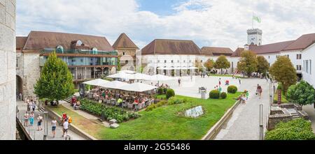 Ljubljana, Slovenia - August 15, 2018: A panoramic view of the Ljubljana Castle interior with its courtyard, much of its buildings and many visitors Stock Photo