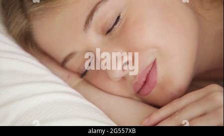 Young Woman sleeping in bed at night, Stock Video