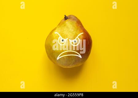 the angry face draw on the fruit food as the halloween concept Stock ...