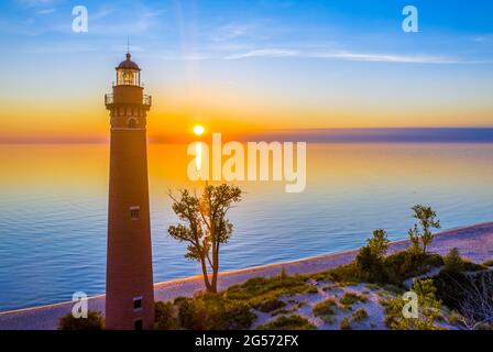 Aerial sunset view of Little Sable Point Lighthouse, located on Lake Michigan near Silver Lake State Park and Mears in Benona Township, Michigan Stock Photo