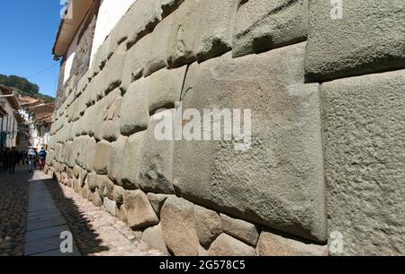 Twelve angles stone, Beautiful narrow street and buildings wall in centre of Cusco or Cuzco city, Peru Stock Photo