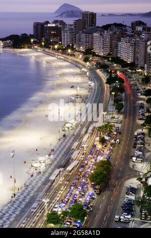 Brazil, Rio de Janeiro, Copacabana Avenida Atlantica and Copacabana Beach at night Stock Photo